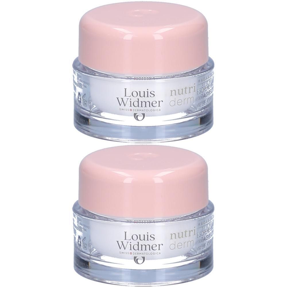 Zwei Cremetiegel mit rosa Deckel. Auf den Tiegeln steht "Louis Widmer nutri derm".