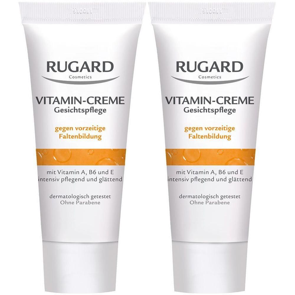 Zwei Tuben RUGARD Vitamin-Creme Gesichtspflege. Weiße Tuben mit Schriftzug und gelbem Streifen. Gegen Faltenbildung.