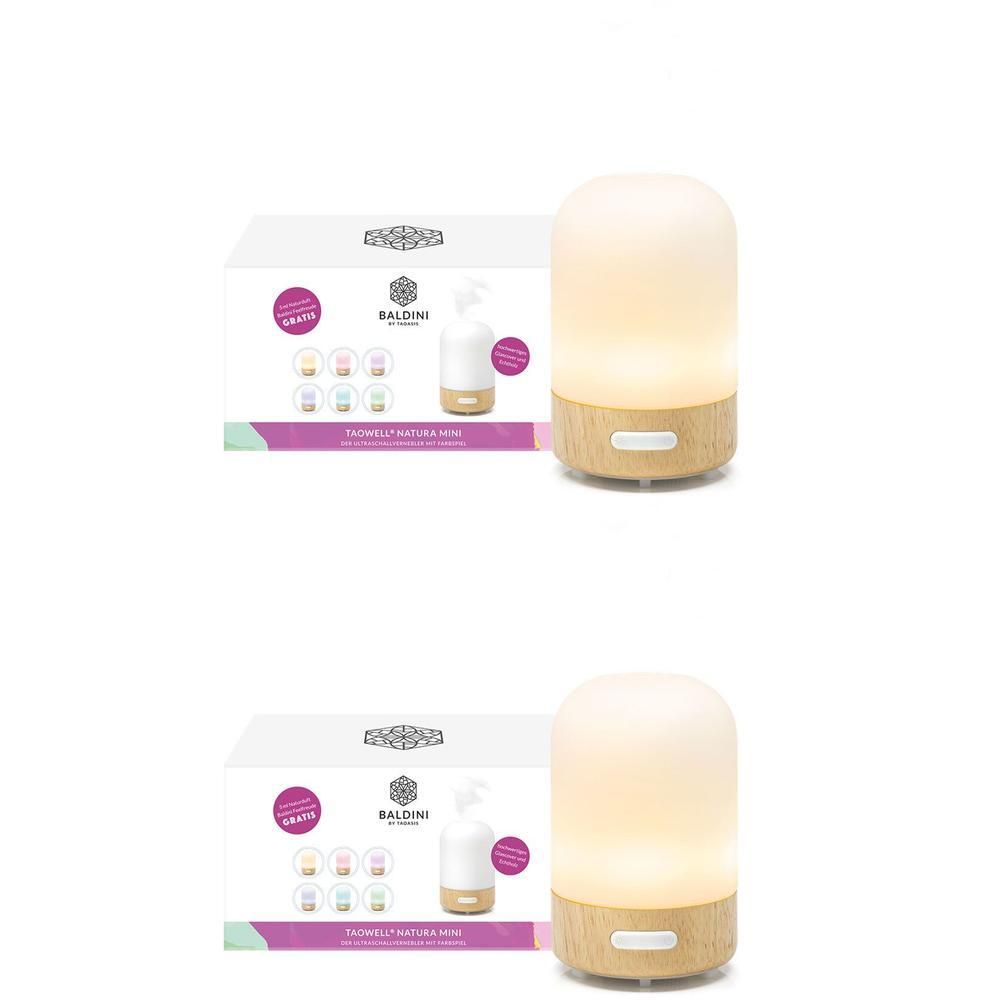 Aromatherapie-Diffusor mit Holzsockel und weißem Gehäuse. Daneben eine Produktverpackung mit Logo und Produktnamen.