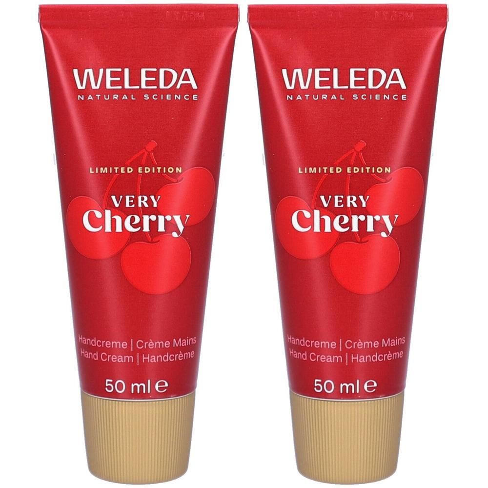 Zwei Tuben Handcreme. Rote Tuben mit weißer Schrift: WELEDA, VERY CHERRY, 50 ml. Goldfarbener Verschluss.