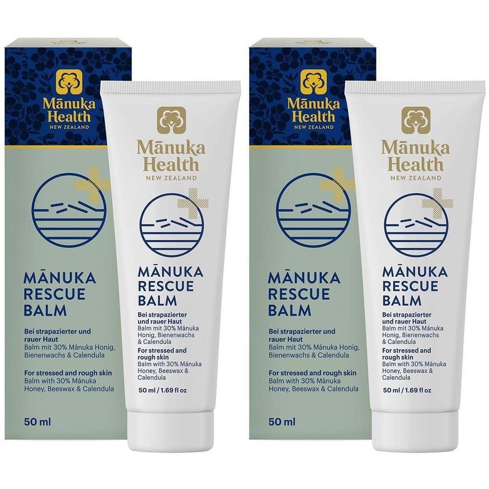 Zwei Tuben und Schachteln. Aufschrift: Manuka Health MANUKA RESCUE BALM. 50 ml. Mit 30% Manuka Honig, Bienenwachs & Calendula.