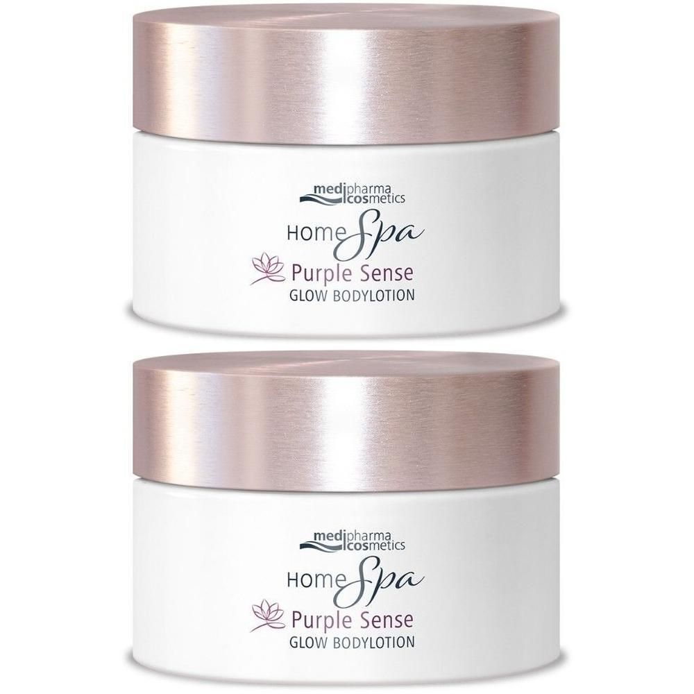 Zwei weiße Tiegel mit rosafarbenen Deckeln. Aufschrift: Home Spa Purple Sense Glow Bodylotion.
