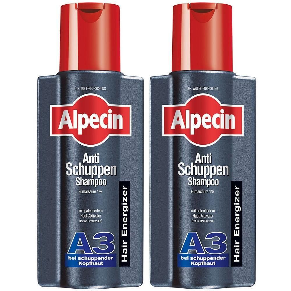 Zwei Flaschen Shampoo mit rotem Deckel. Aufschrift: Alpecin, Anti-Schuppen Shampoo, A3. Schwarze Flaschen mit weißer Schrift.