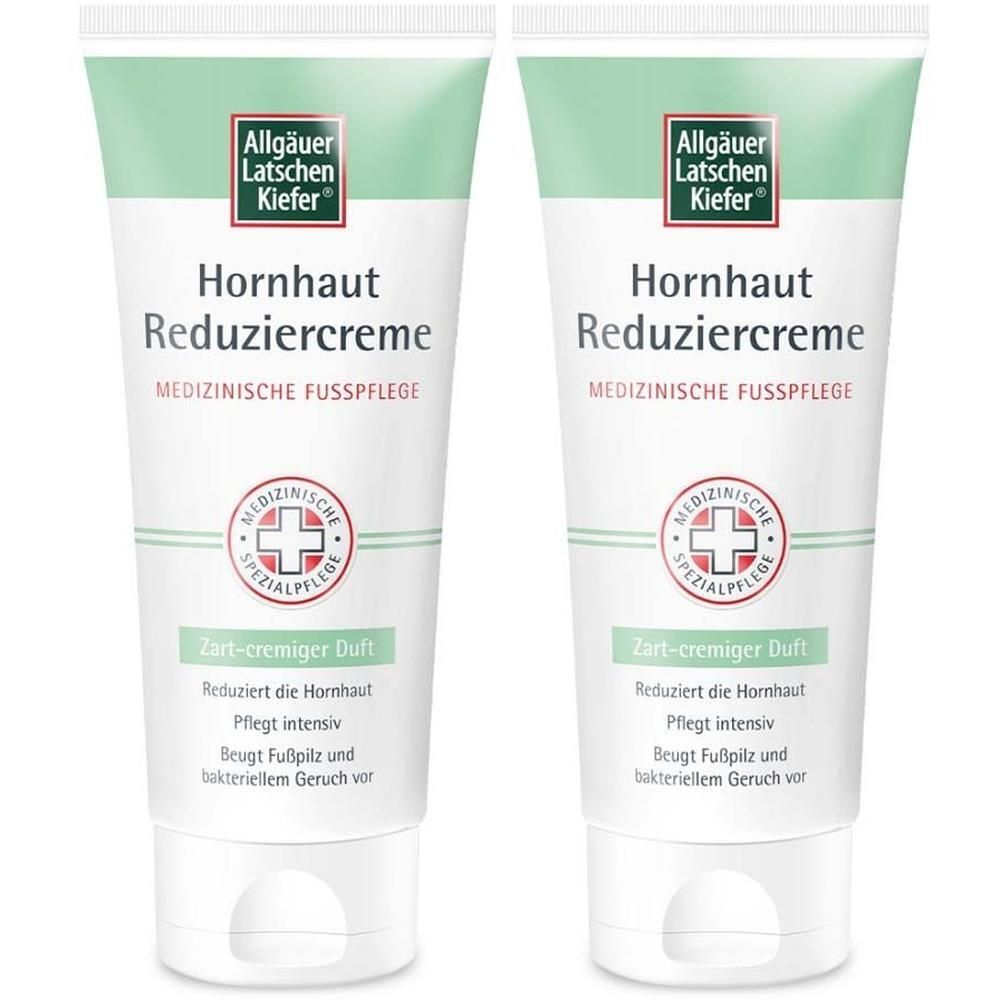 Zwei Tuben Hornhaut Reduziercreme. Weiß-grüne Verpackung mit Logo und Produktinformationen. Medizinische Fußpflege.
