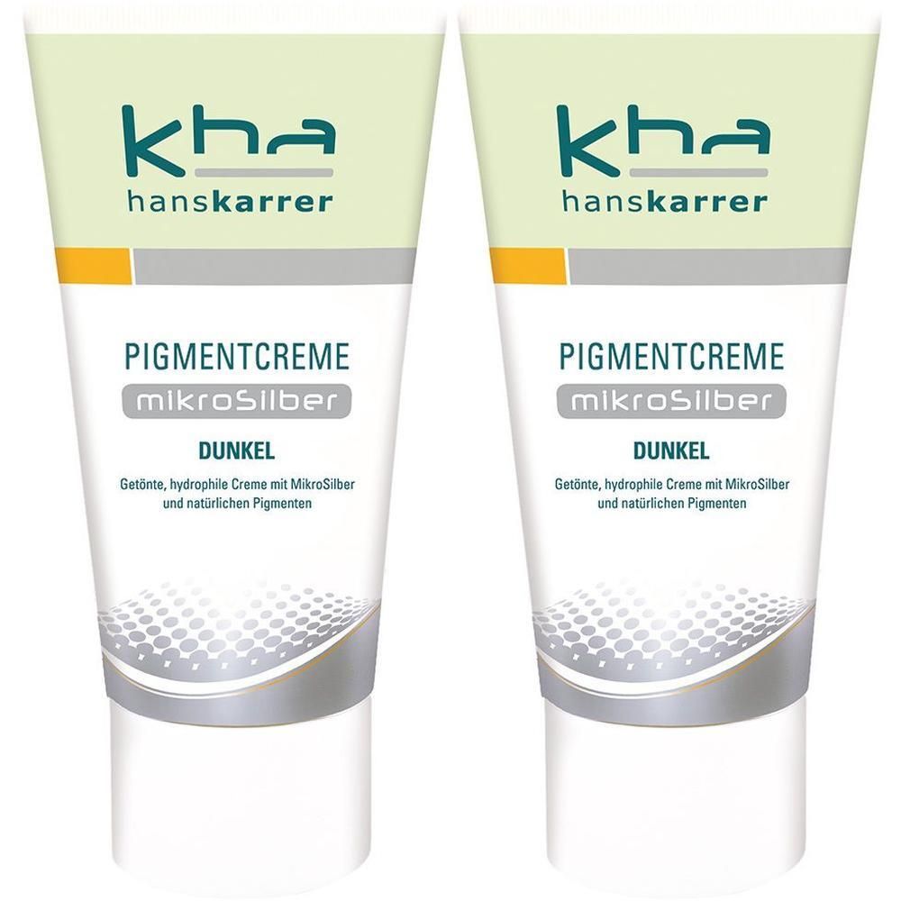 Zwei Tuben Pigmentcreme mikroSilber Dunkel. Aufschrift: kha hanskarrer. Weiße Tuben mit grüner und gelber Schrift.