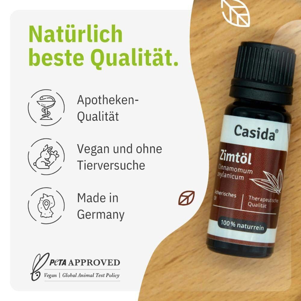 Eine Flasche Casida Zimtöl. Text mit Informationen über Apothekenqualität, vegane Herstellung und Herkunft aus Deutschland.