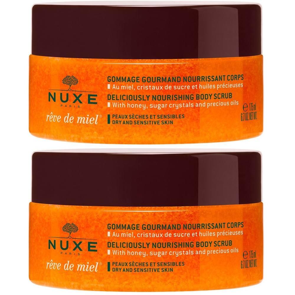 Zwei Tiegel Körperpeeling. Orangefarbenes Produkt mit braunem Deckel. Text: NUXE, Reve de Miel, Gommage Gourmand Nourrissant Corps.