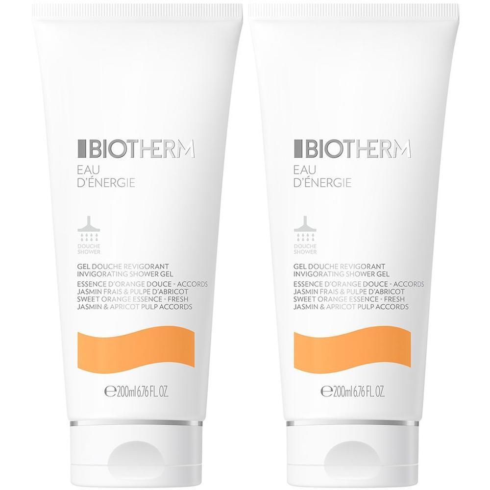 Zwei Tuben BIOTHERM Eau d'Energie Duschgel. Weiß, mit orangefarbenem Akzent. Text: BIOTHERM, Eau d'Energie, Gel Douche Revigorant. 200ml.