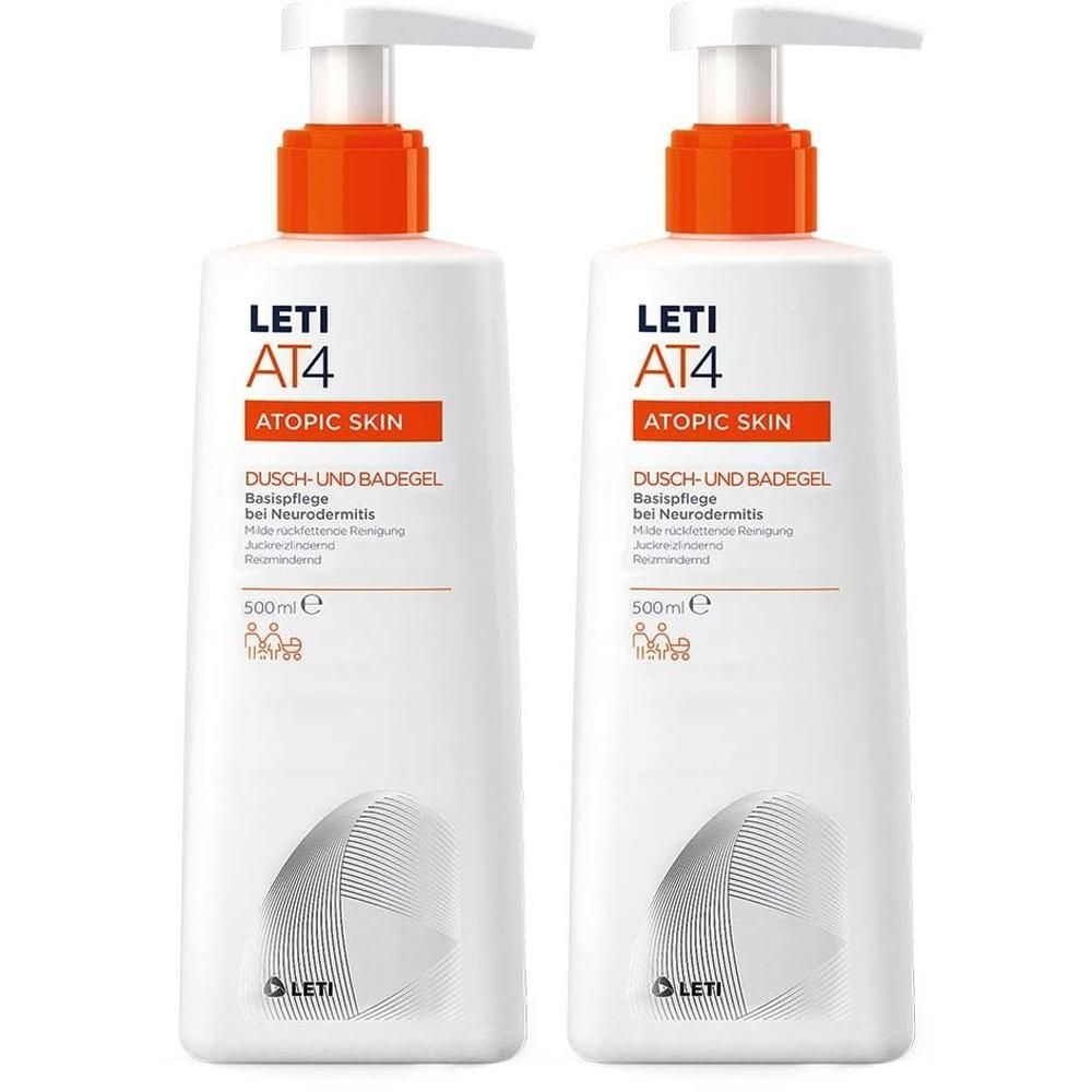 Zwei weiße Flaschen LETI AT4 Dusch- und Badegel mit orangefarbenen Akzenten und Dosierpumpen. Text: ATOPIC SKIN, 500ml.