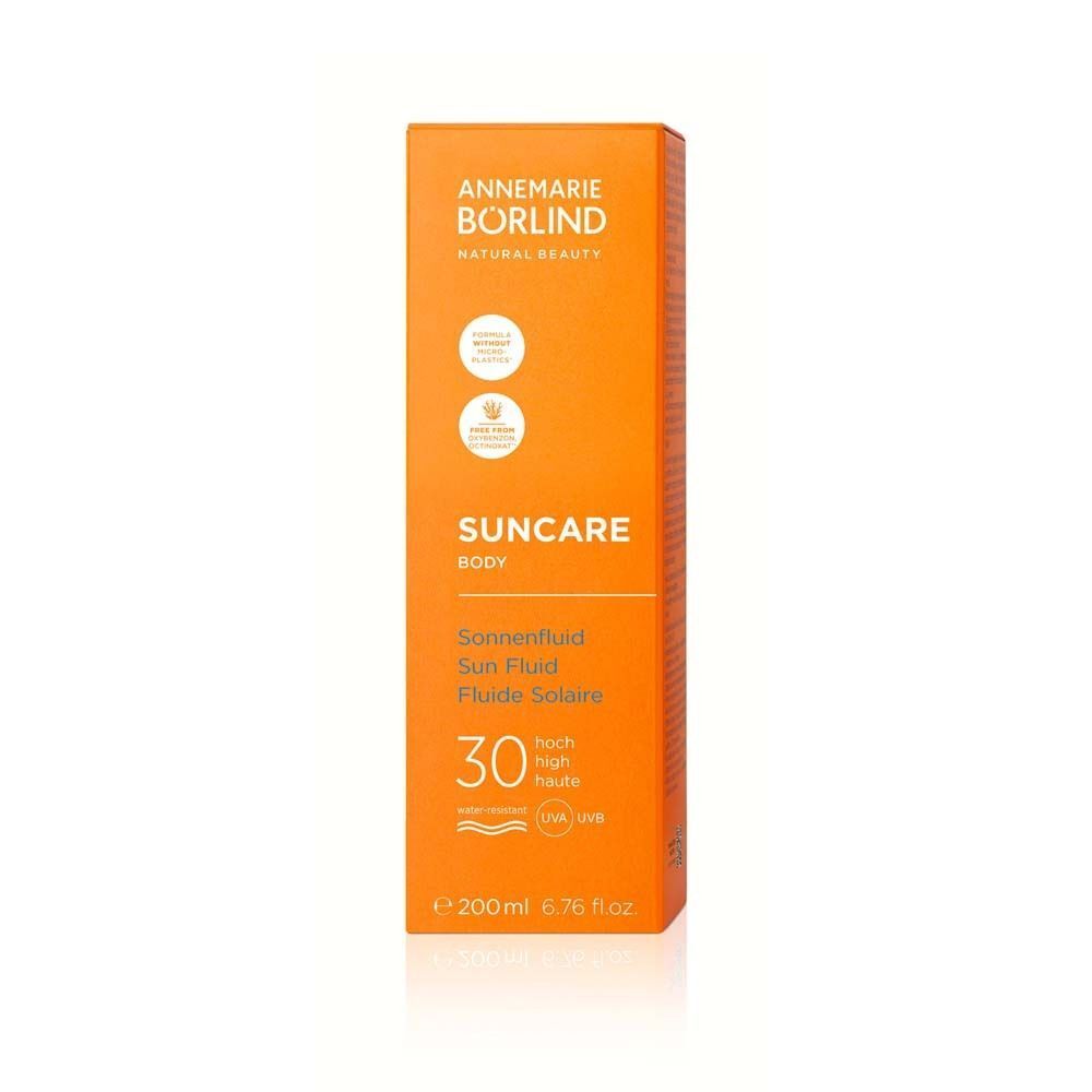 Orangefarbene Produktverpackung. Text: SUNCAR, Body, Sonnenfluid, LSF 30. Mit weißem Deckel.