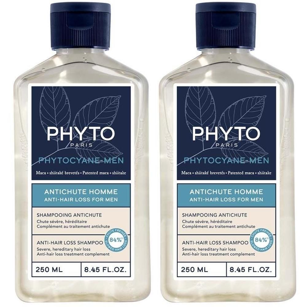 Zwei Flaschen Shampoo. Klare Flüssigkeit, blaue Etiketten mit Logo und Text. "PHYTO PARIS" und "Phytocyane-Men" sichtbar.