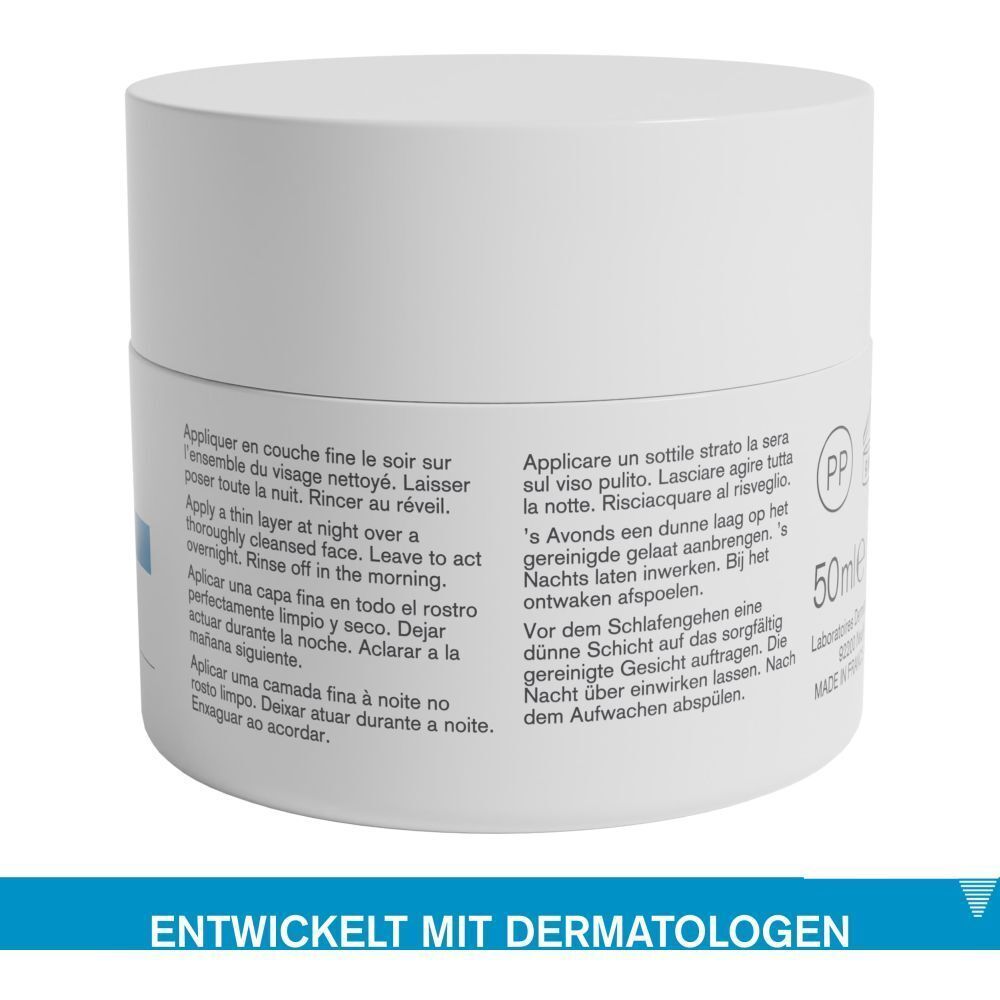 Weißer Tiegel mit blauer Schrift. Aufschrift: Anwendungsanweisungen in mehreren Sprachen. Entwickelt mit Dermatologen. 50ml.