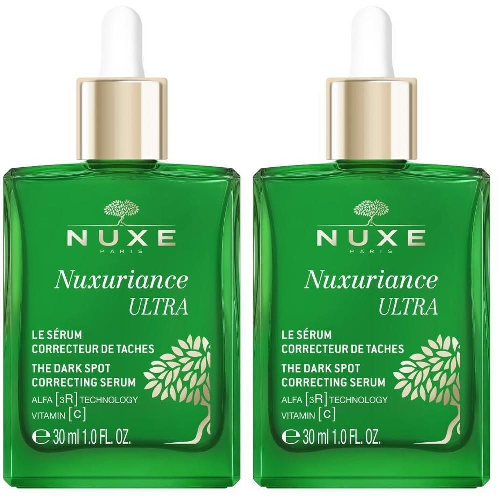 Zwei grüne Serumflaschen mit weißer Pipette. Aufschrift: NUXE Nuxuriance Ultra, Le Sérum Correcteur de Taches, 30 ml.