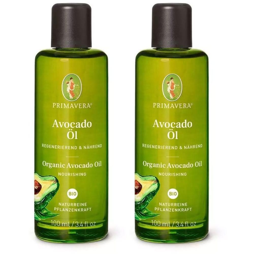 Zwei grüne Flaschen mit Avocadoöl. Aufschrift: PRIMAVERA, Avocado Öl, Organic Avocado Oil, BIO. Flaschen mit schwarzem Deckel.