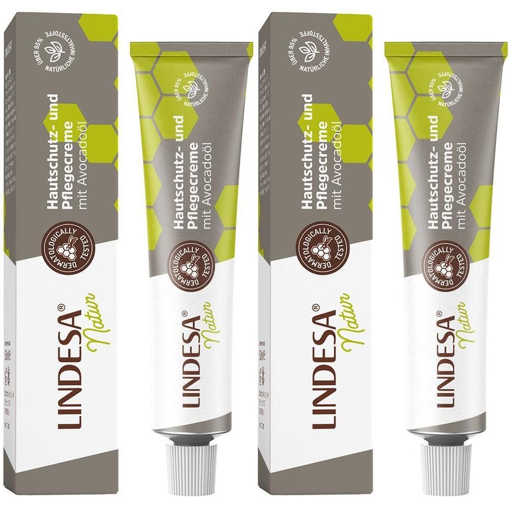 Creme-Tube und Faltschachtel. Grün-weißes Design mit Produktnamen und Logo. Dermatologisch getestet.