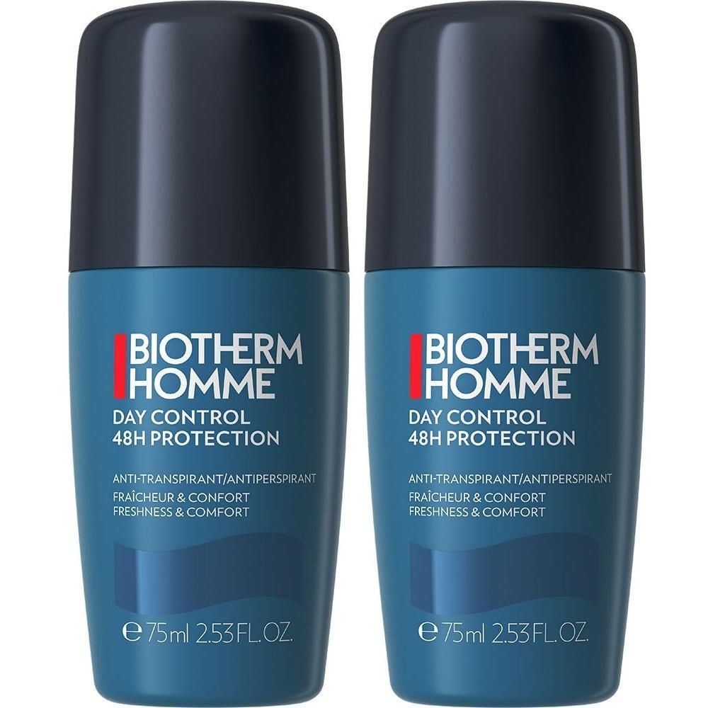 Zwei BIOTHERM HOMME Day Control 48H Deo Roll-On. Blaue Flaschen mit schwarzem Deckel. Text: Day Control 48H Protection, Anti-Transpirant.