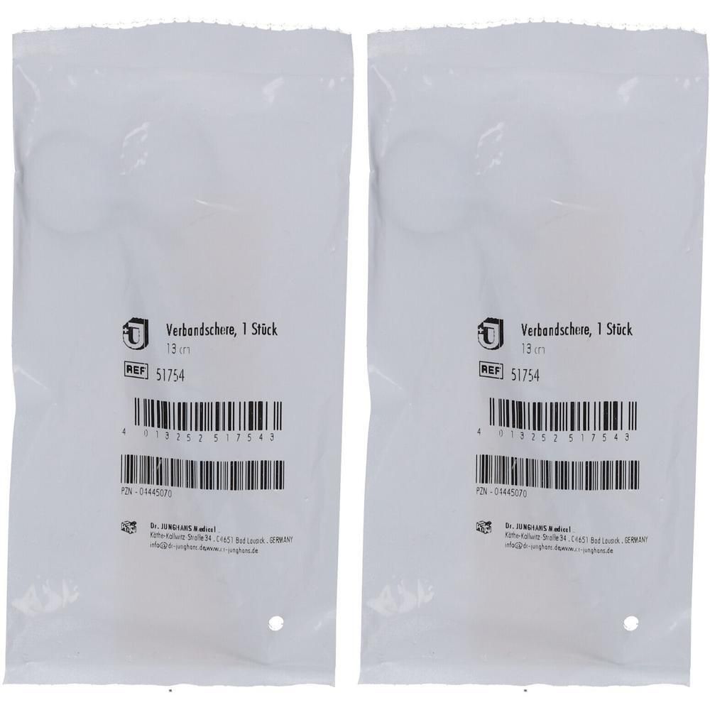 Zwei weiße Verpackungen mit Aufdruck. Text: Verbandschere, 1 Stück, 13 cm. REF 51754. Barcode und weitere Angaben.