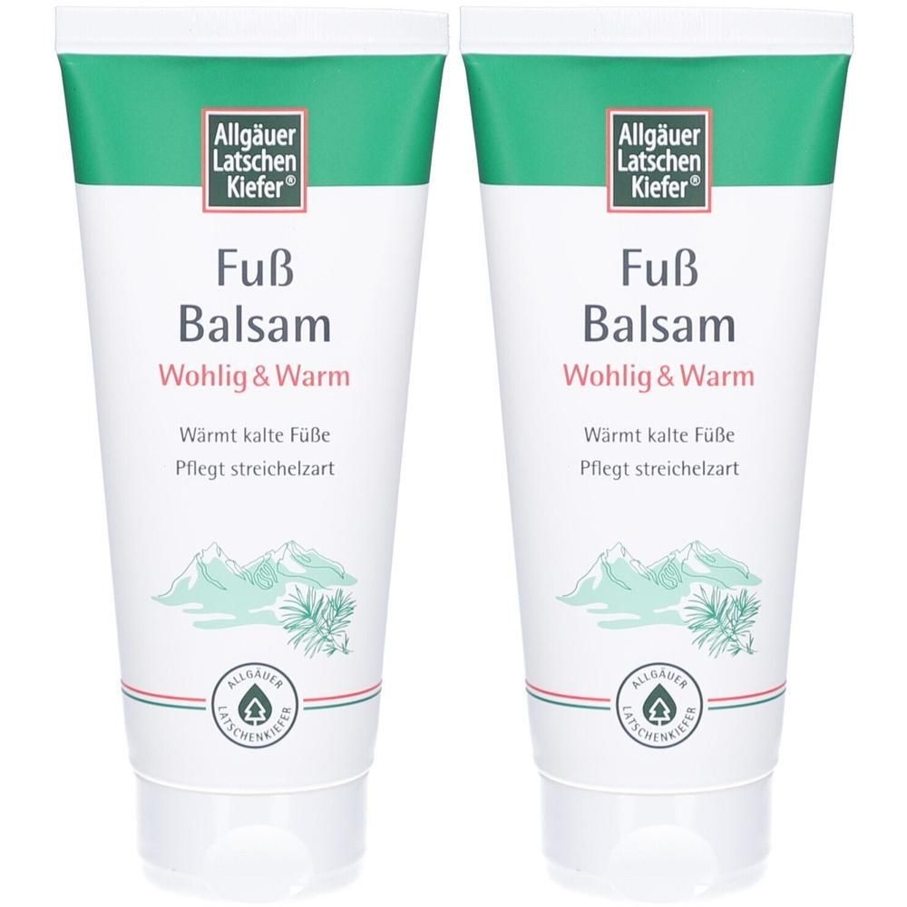 Zwei Tuben Fußbalsam. Weiß, mit grünem Deckel und Schriftzug. Aufschrift: Allgäuer Latschenkiefer Fuß Balsam, Wohlig & Warm.