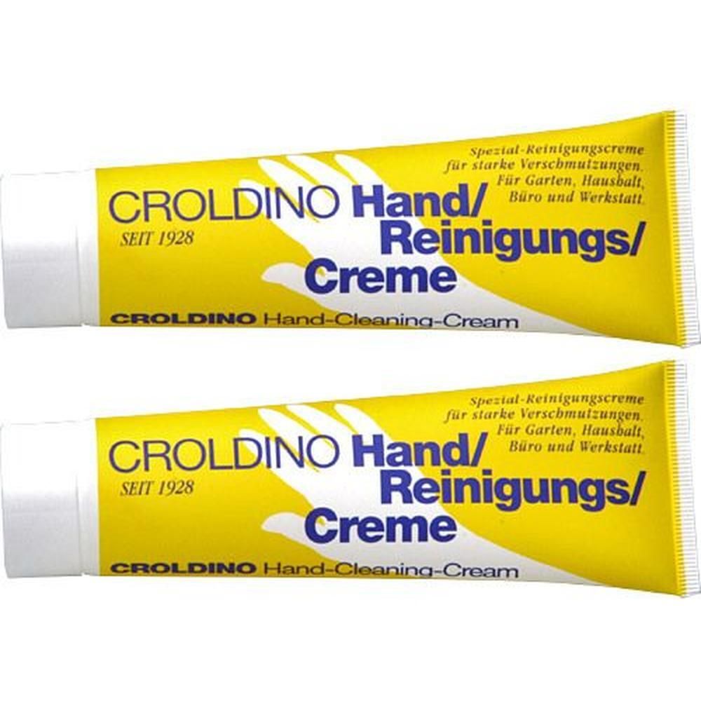 Zwei gelbe Tuben mit weißem Verschluss. Aufschrift: CROLIDINO Hand/Reinigungs/Creme. Text: Hand-Cleaning-Cream. Seit 1928.