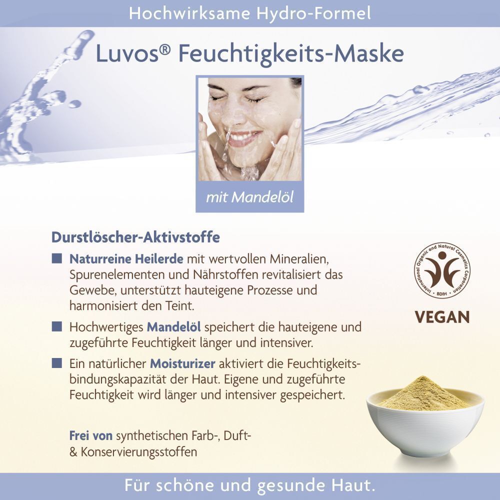 Feuchtigkeitsmaske mit Mandelöl. Aufschrift: Luvos Feuchtigkeits-Maske. Bild einer Frau. Vegan-Siegel. Text über Inhaltsstoffe und Vorteile. Schale mit Pulver.