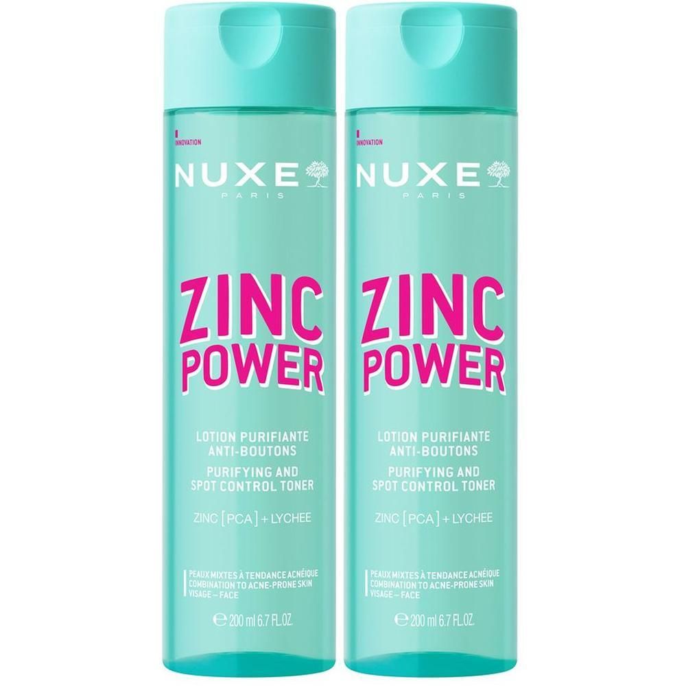 Zwei Flaschen NUXE Zinc Power Lotion. Türkisgrüne Flaschen mit hellblauem Deckel. Aufschrift: ZINC POWER in Pink.
