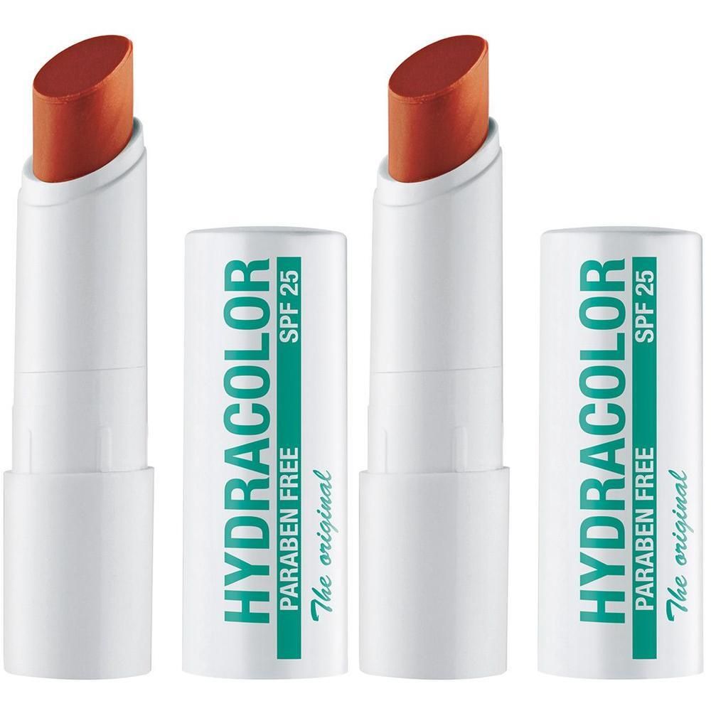 Lippenpflege mit geöffneter und geschlossener Hülse. Weißer Stift mit orangefarbener Spitze. Aufschrift: HYDRACOLOR, SPF 25, PARABEN FREE.