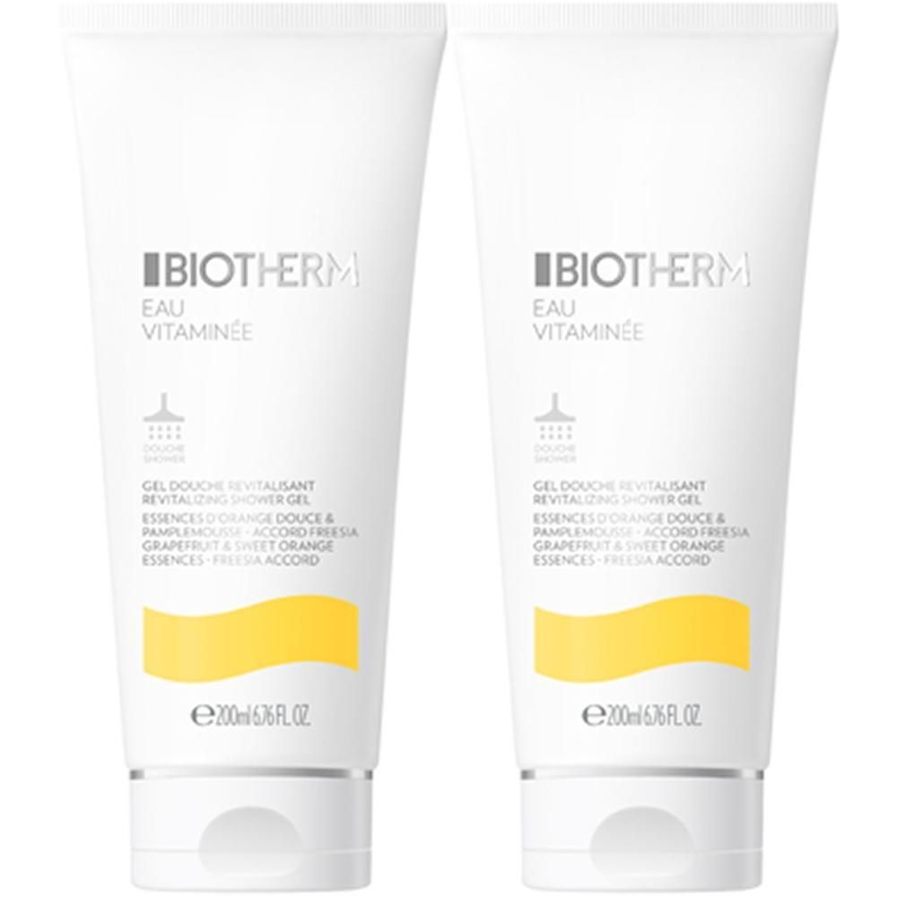 Zwei Tuben Duschgel. Weiß, mit gelbem Streifen und Schriftzug. Marke: BIOTHERM Eau Vitaminee.