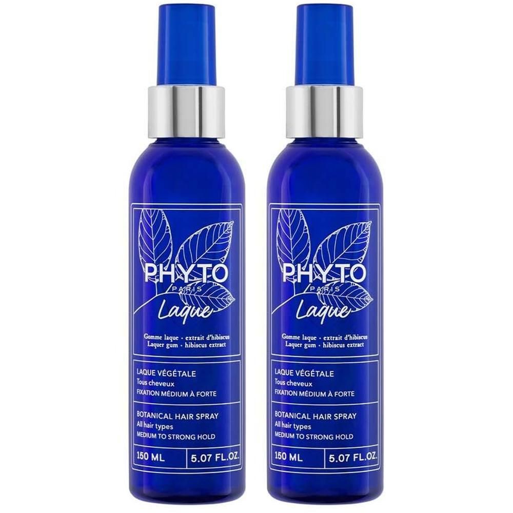 Zwei blaue Sprühflaschen mit silbernen Ringen und blauen Sprühköpfen. Aufschrift: PHYTO PARIS, Laque, Botanical Hair Spray.