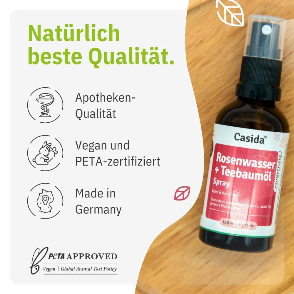 Casida® Rosenwasser + Teebaumöl Spray. Flasche mit weißem Etikett. Text: Apotheken-Qualität, Vegan und PETA-zertifiziert, Made in Germany.