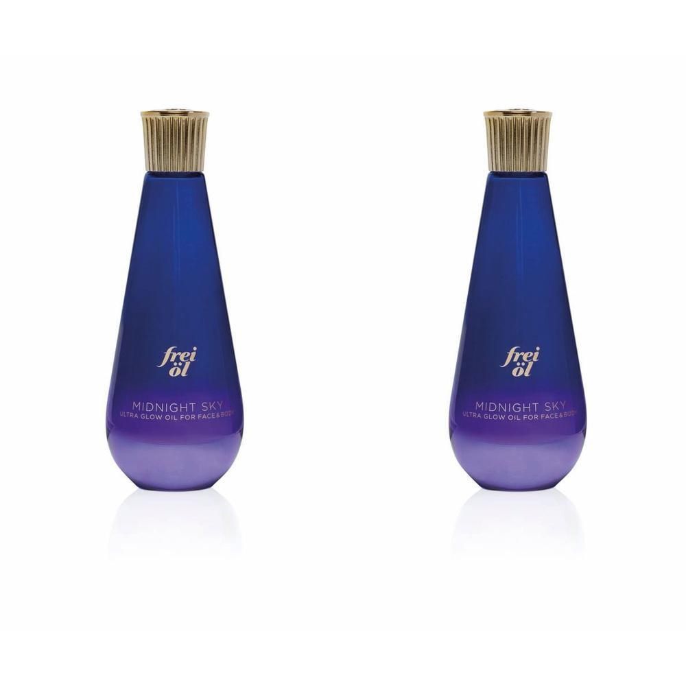 Zwei blaue Flaschen mit goldenen Verschlüssen. Auf jeder Flasche steht "frei öl" und "MIDNIGHT SKY".