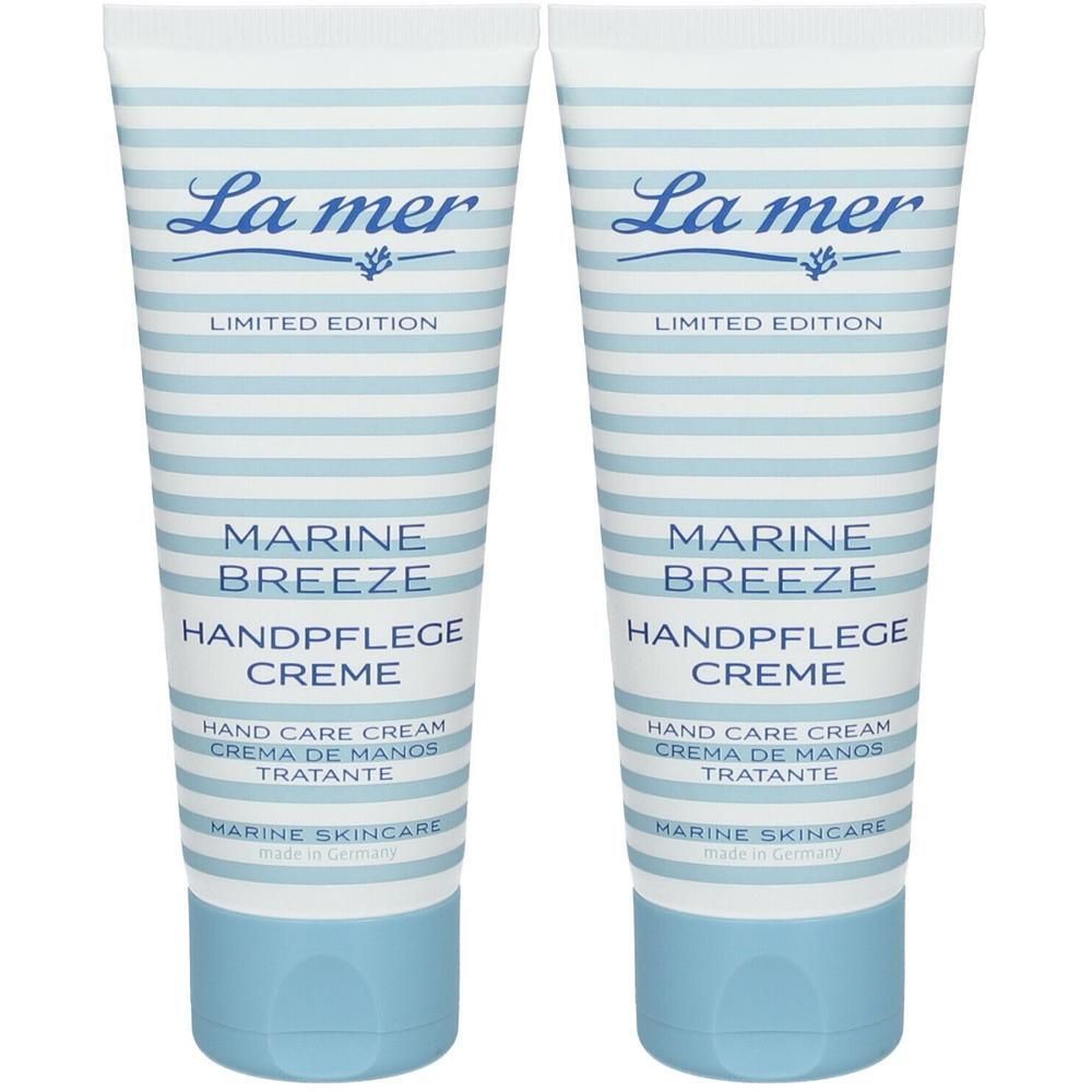 Zwei Tuben Handcreme mit blau-weißem Streifenmuster. Aufschrift: La mer, Marine Breeze, Handpflege Creme. Limited Edition.