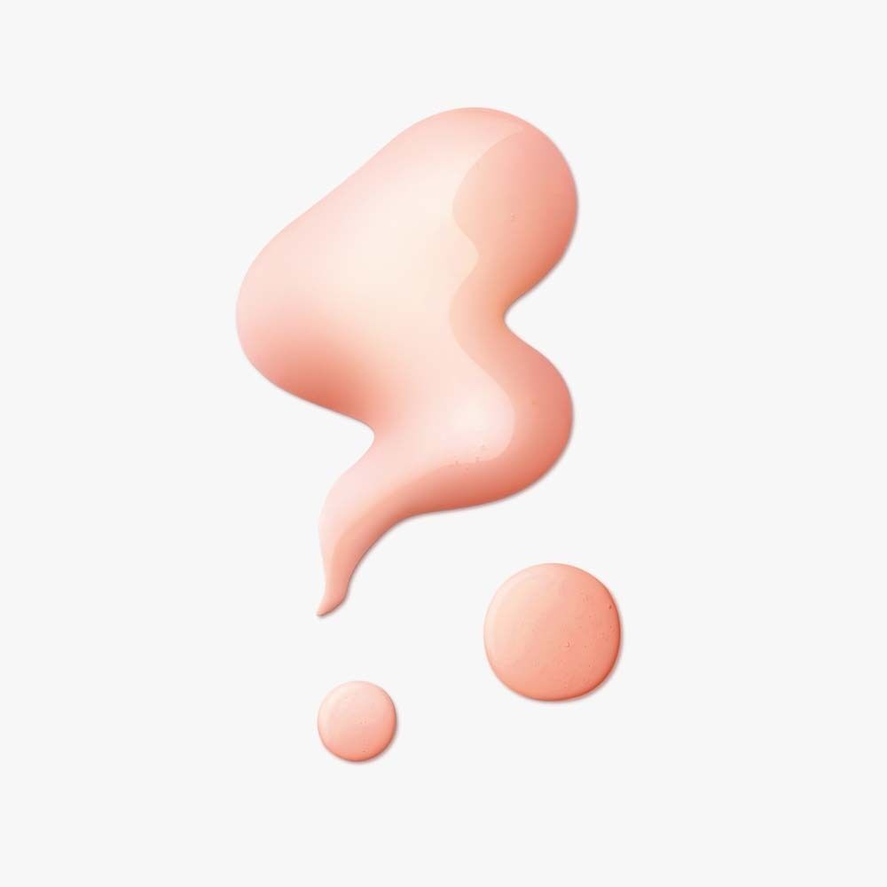Ein Tropfen rosafarbener Lotion mit kleineren Tropfen daneben.