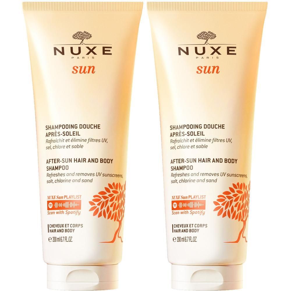 Zwei Tuben NUXE Sun After Sun Duschshampoo. Weiß-beige Tuben mit orangefarbenem Baum-Design und Produktinformationen. Text: After-Sun Hair and Body Shampoo.