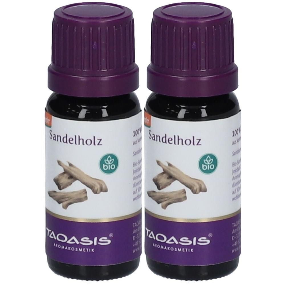 Zwei kleine Glasflaschen mit lila Deckeln. Auf den Etiketten steht "Sandelholz" und "bio". Marke TAOASIS.