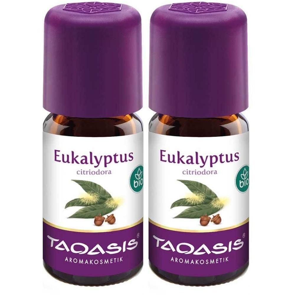 Zwei kleine Glasflaschen mit lila Deckeln. Auf den Etiketten steht "Eukalyptus citriodora Bio" und "TAOASIS Aromakosmetik".