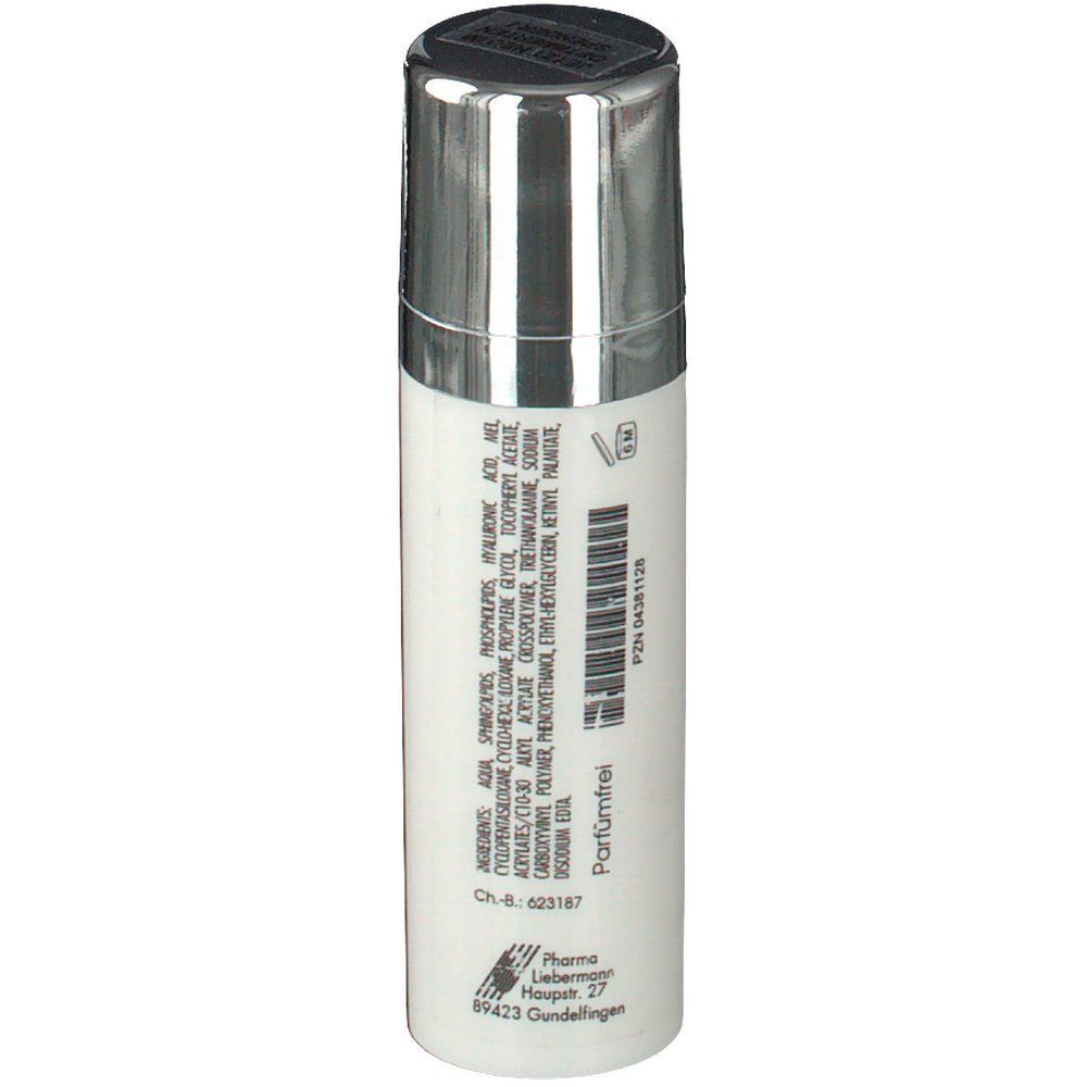 Weiße Flasche mit silbernem Deckel. Rückseite mit Inhaltsstoffen, Chargennummer, und Herstellerinformationen. Parfümfrei.