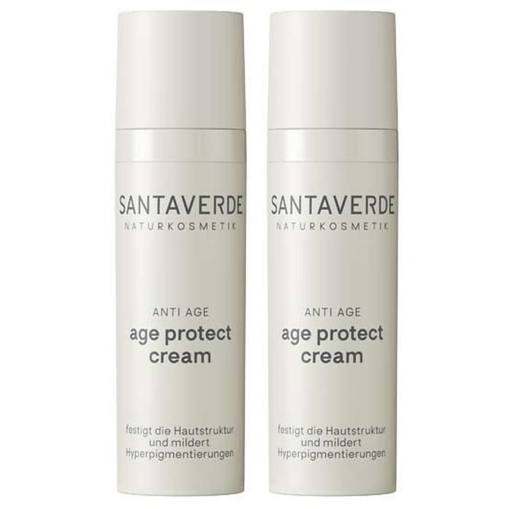 Zwei SANTAVERDE age protect cream Flaschen. Weiß, zylindrisch, mit weißem Deckel. Beschriftung: SANTAVERDE, age protect cream.
