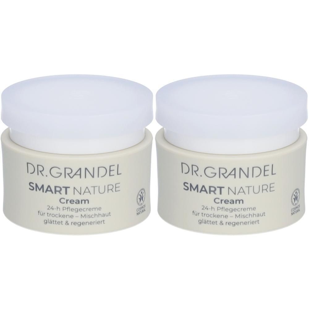Zwei Cremetiegel mit weißen Deckeln. Auf den beigen Tiegeln steht "DR. GRANDEL SMART NATURE Cream". Text darunter: 24-h Pflegecreme für trockene - Mischhaut.