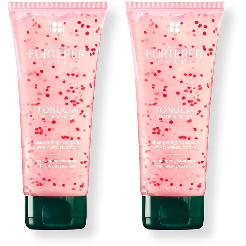 Zwei Tuben Shampoo. Rosa Flüssigkeit mit roten Partikeln. Grüner Verschluss. Schriftzug: FURTERER PARIS, TONUCIA NATURAL FILLER.
