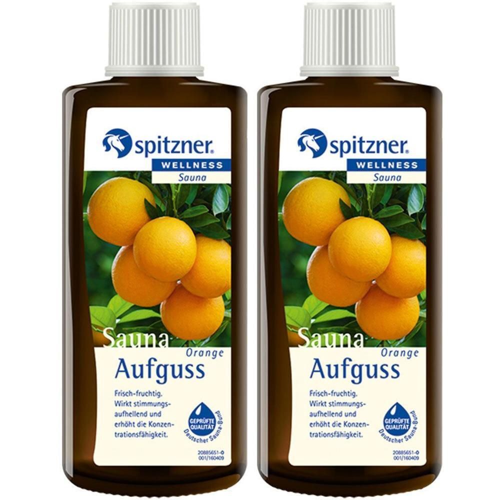 Zwei braune Flaschen mit weißem Deckel. Auf dem Etikett: Orangen, Schriftzug Sauna Aufguss, Marke Spitzner. Geprüfte Qualität.