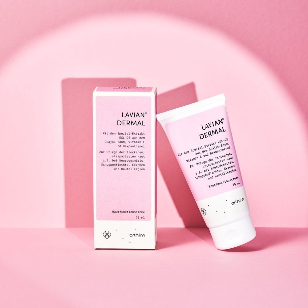 Lavian® Dermal Creme, Tube und Schachtel. Rosa Tube und Schachtel vor rosa Hintergrund. 75 ml.