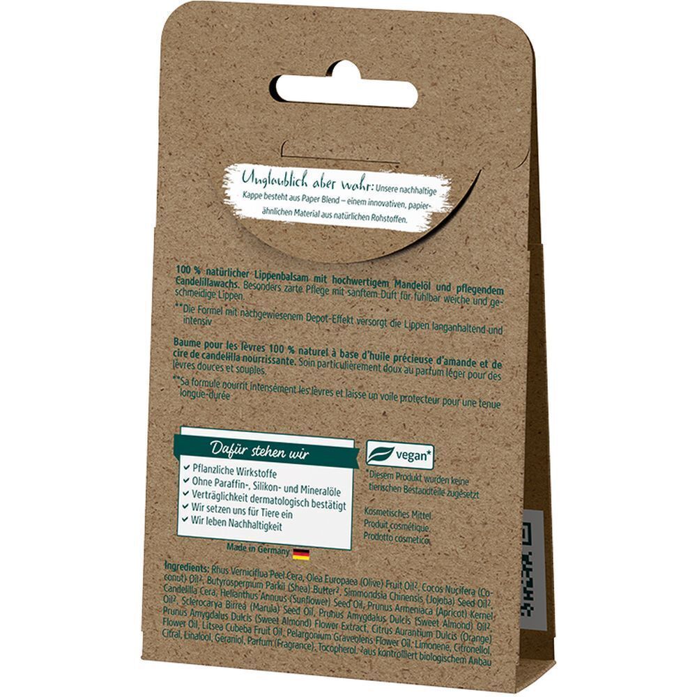 Rückseite der Lippenpflege-Verpackung. Text in deutscher Sprache. Enthält Informationen über Inhaltsstoffe, vegane Zertifizierung und Herkunft.