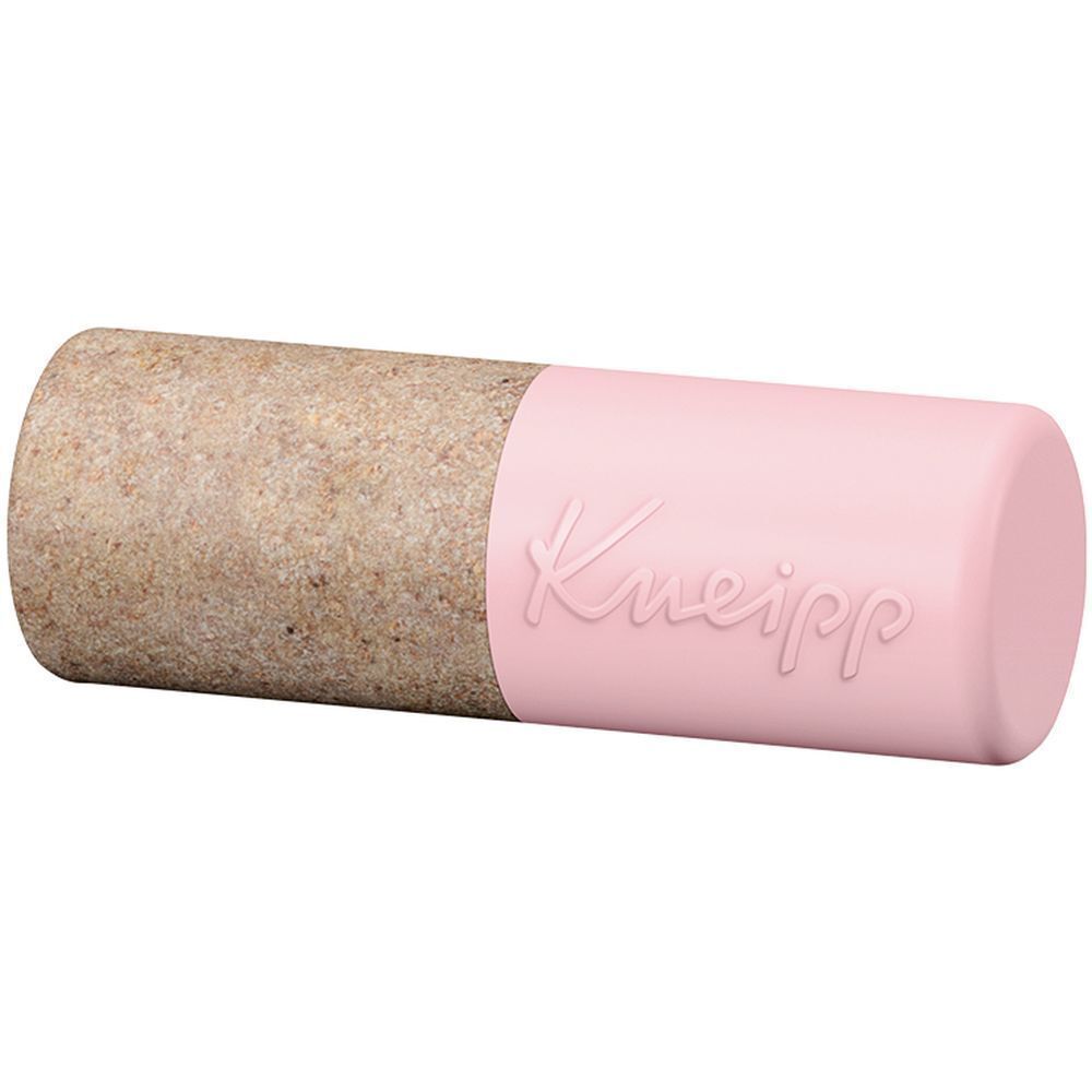 Lippenpflegestift. Rosa Kappe mit geprägtem Logo. Unterteil aus braunem Material. Liegt horizontal.