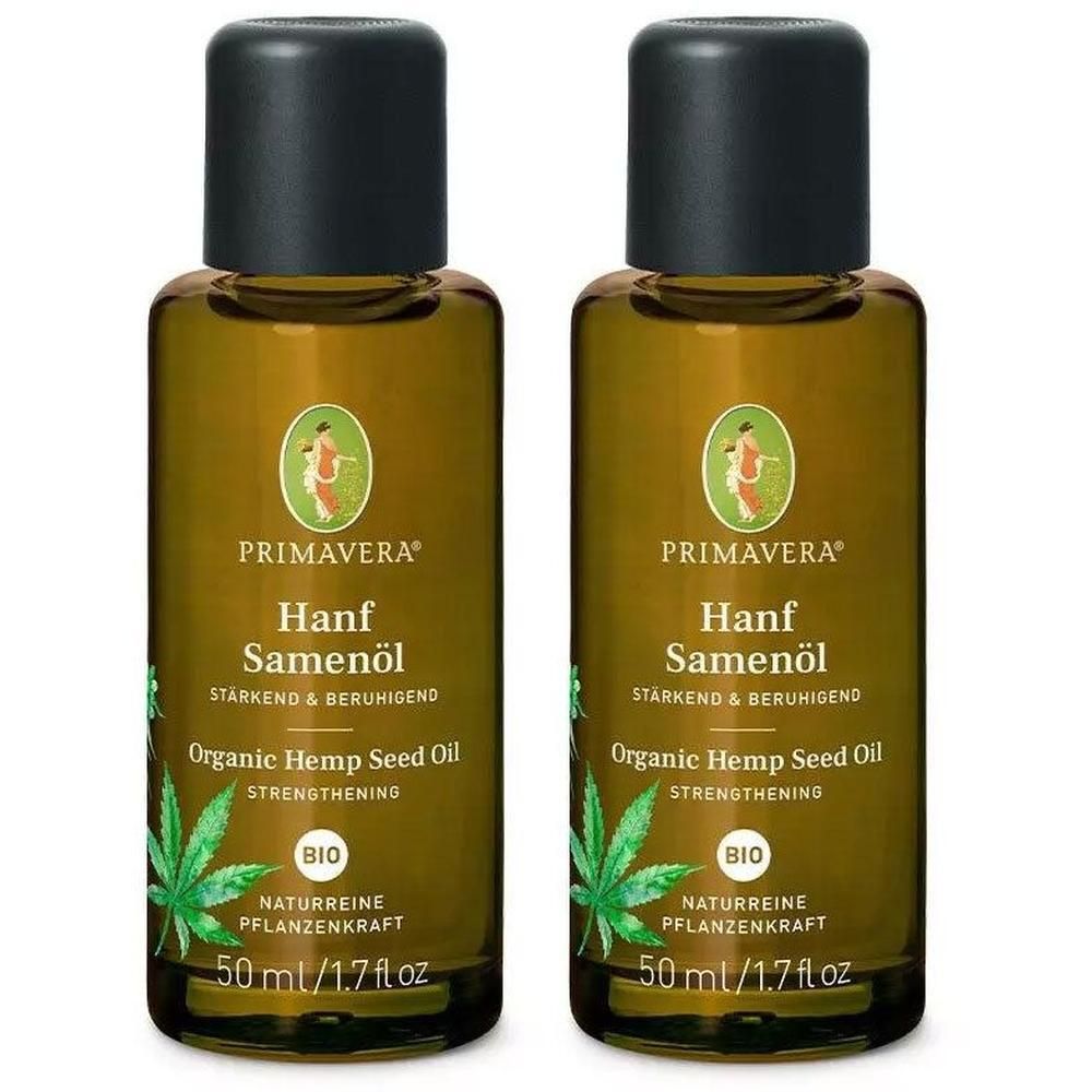 Zwei braune Glasflaschen mit schwarzem Deckel. Aufschrift: PRIMAVERA Hanf Samenöl, BIO. Enthält 50 ml/1.7 fl oz.