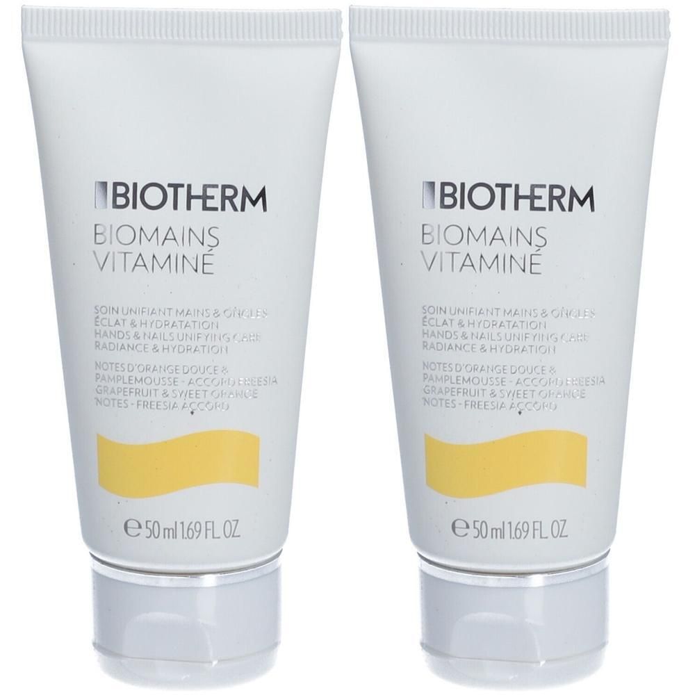 Zwei Tuben BIOTHERM Biomains Vitaminee Handcreme. Weiße Tuben mit schwarzem Schriftzug. Gelber Akzent. 50 ml.