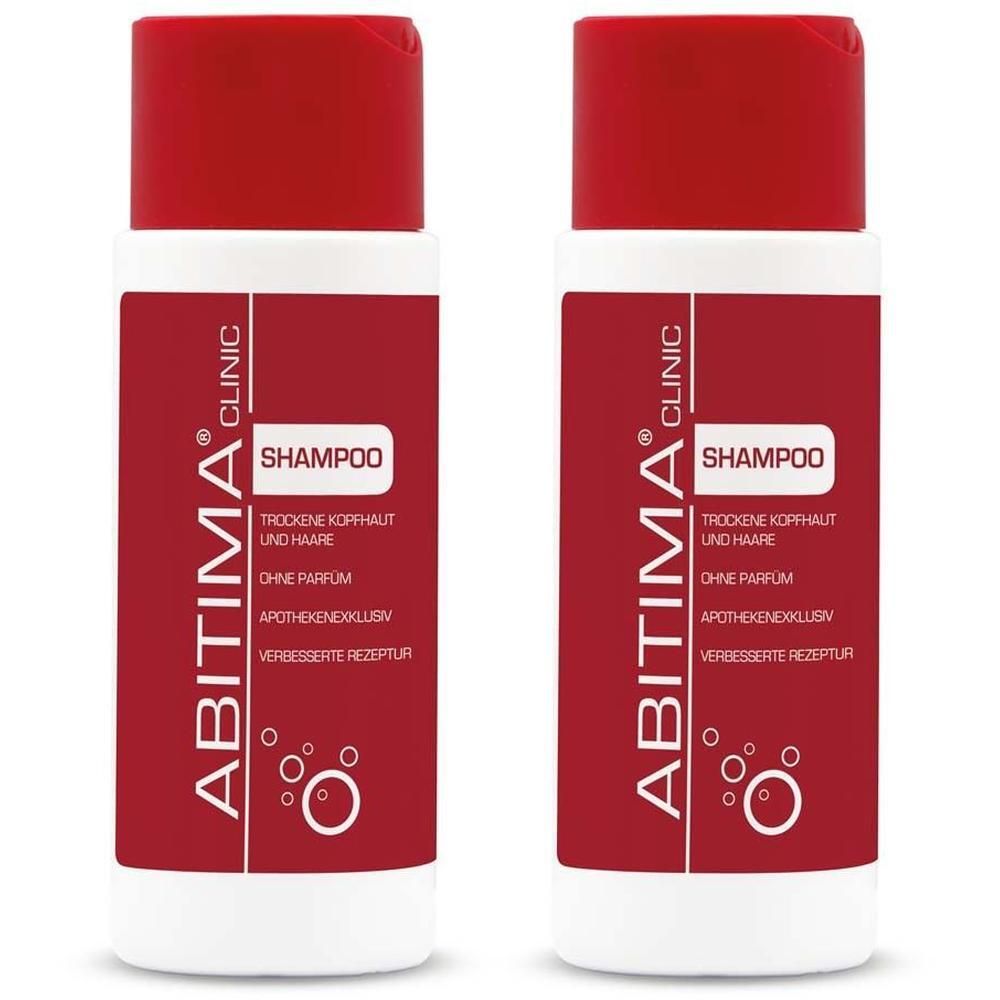 Zwei Flaschen ABITIMA® CLINIC Shampoo. Rote Kappen, weiße Flaschen mit rotem Etikett. Text: Shampoo, trockene Kopfhaut und Haare.