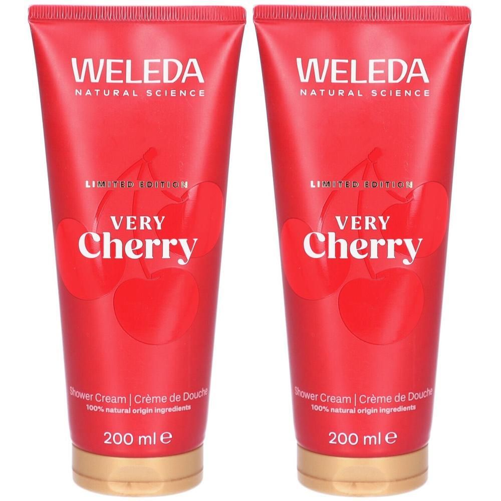 Zwei rote Tuben mit Kirschmotiv. Aufschrift: WELEDA, VERY CHERRY, Shower Cream. Goldfarbener Verschluss. 200 ml.