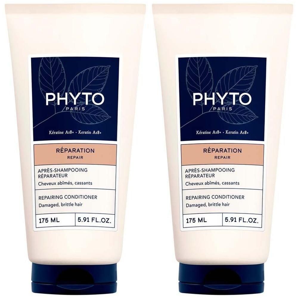 Zwei Tuben PHYTO PARIS Repair Conditioner. Weiße Tuben mit schwarzem Deckel. Etikett mit Logo und Produktinformationen.