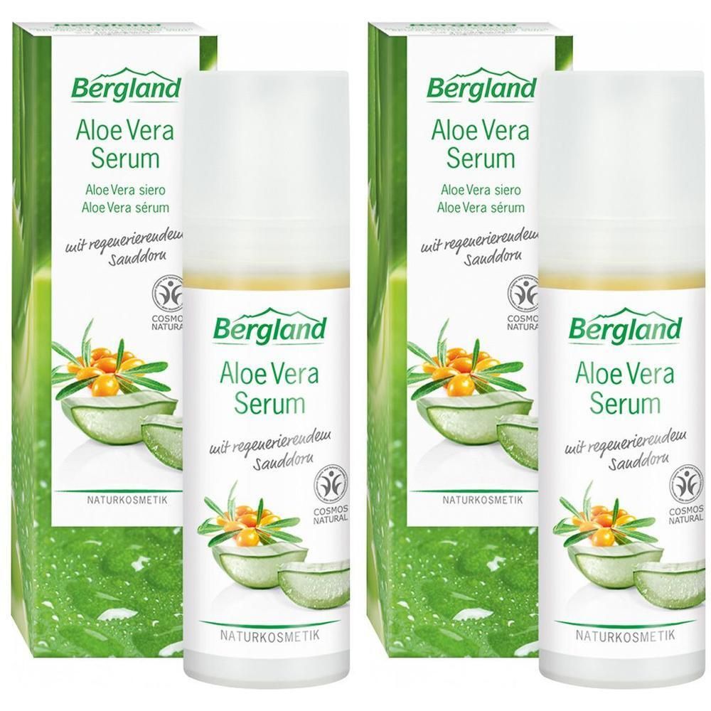 Zwei Flaschen Aloe Vera Serum mit Verpackung. Aufschrift: Bergland Aloe Vera Serum, Naturkosmetik. Mit Sanddorn.