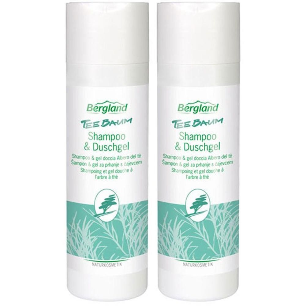 Zwei weiße Flaschen mit grünem Etikett. Aufschrift: Bergland Tee Baum Shampoo & Duschgel. Naturkosmetik.